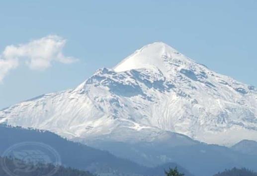 Fuerte nevada y lluvia visten de blanco al Pico de Orizaba