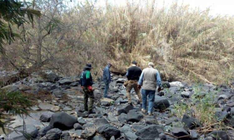 Hallan restos de 59 personas en fosas clandestinas en centro de México