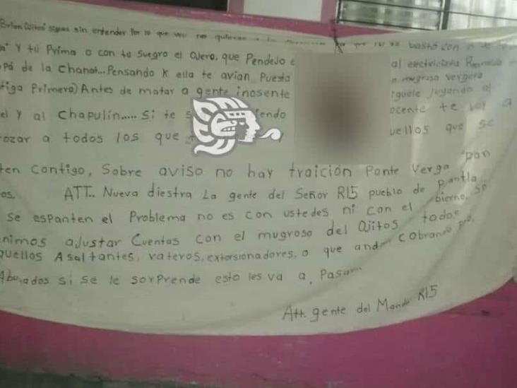 En Papantla dejan colgada cabeza cercenada y narco lona