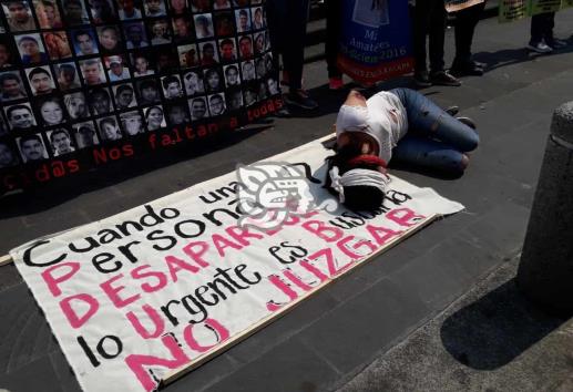 Familiares esperan meses en Veracruz para recibir cuerpos de hijos desparecidos