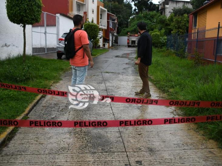 Afectaciones en vehículos y viviendas en Xalapa tras intensa lluvia