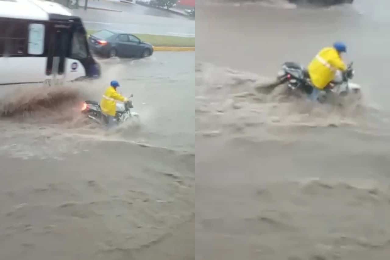 Motociclista lucha contra la corriente en avenida de Veracruz (+video)