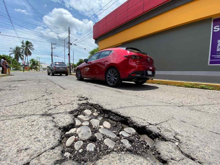 ¡De alegre nada! Vecinos de Vista Alegre en Veracruz se quejan de calles con baches