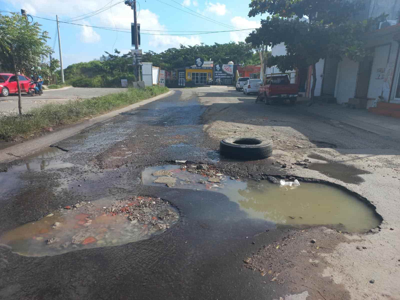 Baches y socavones destruyen vehículos de veracruzanos