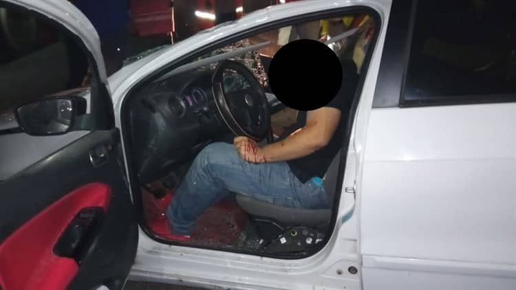 Joven muere prensado en Veracruz; quiso ganarle el paso a un tráiler