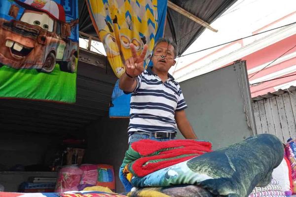 Juan y Lupe: 25 años de vender el cobertor de tigre en Veracruz (+video)