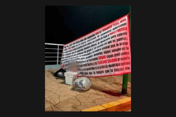 Hallan restos embolsados de comandante policial junto a narcomanta en Espinal