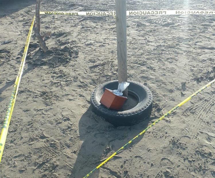 Tiran urna con cenizas en Playa de Chachalacas