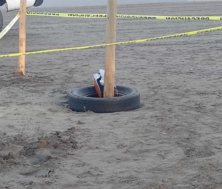 Tiran urna con cenizas en Playa de Chachalacas