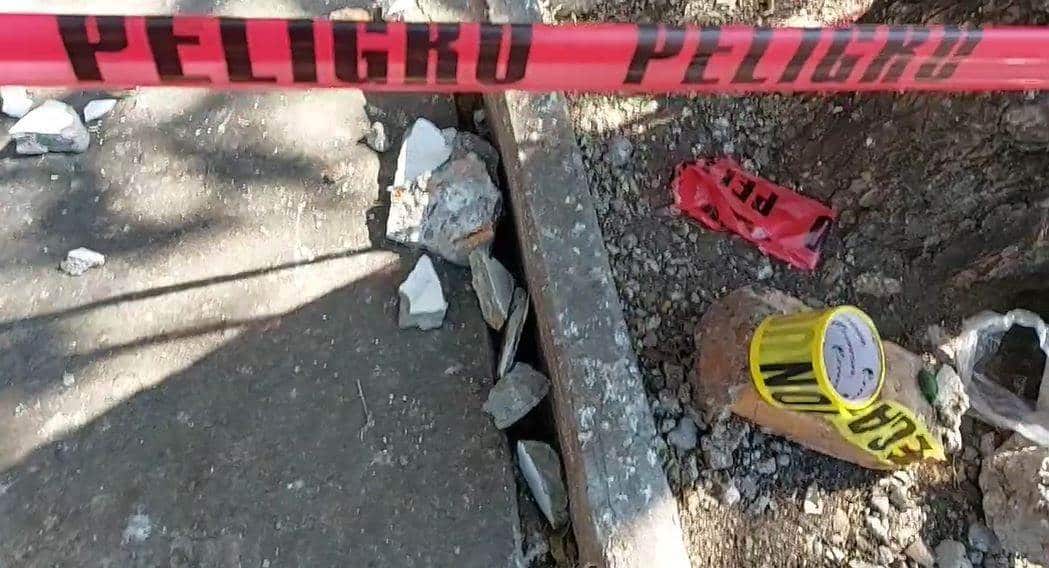 Pedazo de concreto de edificio descalabra a padre de familia en zona escolar de Veracruz