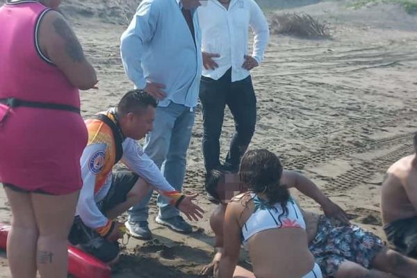 ¡Casi no la cuentan! Salvan a chilangos de morir ahogados en Playa Chalchihuecan