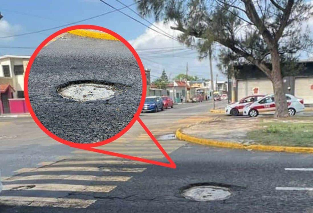 Coladera desnivelada hace brincar a automovilistas sobre calles de Veracruz