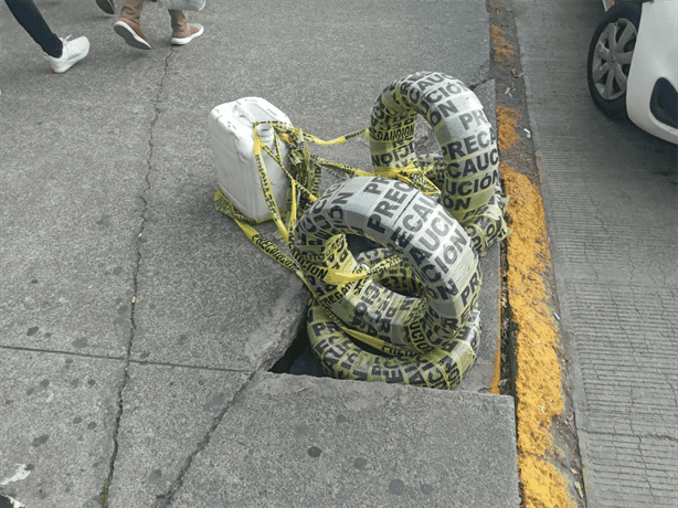 Tramo sumido de banqueta junto a Central Camionera