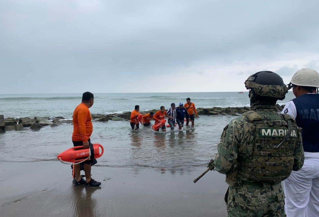 Elementos de Marina salvan a turista de Puebla alcoholizado en playa Chachalacas