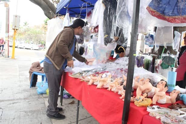 Vestir al niño Dios, una tradición que sigue vigente en comerciantes de Veracruz | VIDEO