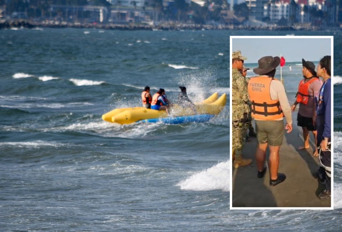 Rescatan a pareja de turistas; banana vuelca por oleaje en Boca del Río