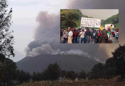 Bloquean carreteras por falta de apoyo de Gobierno de Veracruz contra incendios forestales