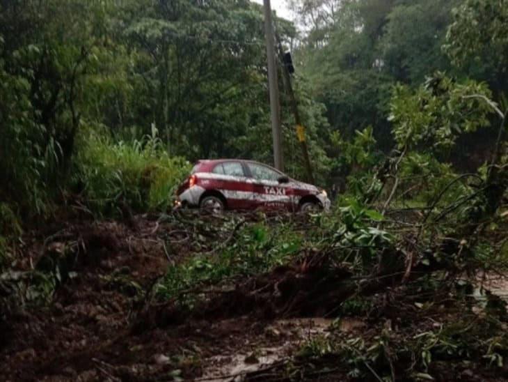 ¡Más afectaciones! ahora en la carretera Fortín-Huatusco; lluvia arrastró un taxi