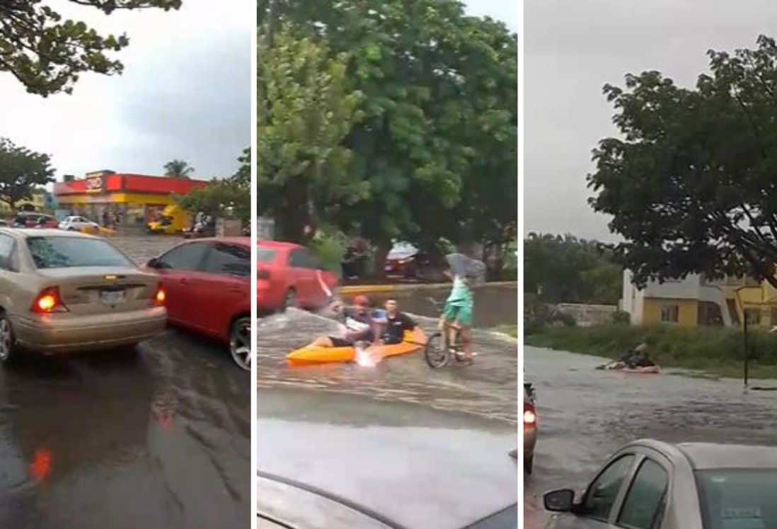 Jóvenes se transportan en kayak en calles inundadas de Medellín de Bravo | VIDEO