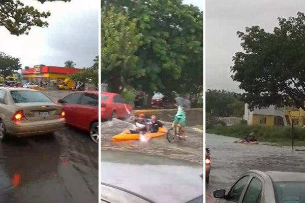 Jóvenes se transportan en kayak en calles inundadas de Medellín de Bravo | VIDEO