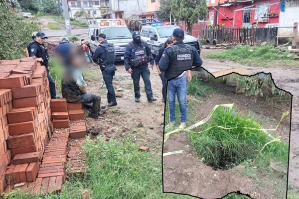 Elementos de SSP rescatan a hombre que cayó a una alcantarilla en Xalapa