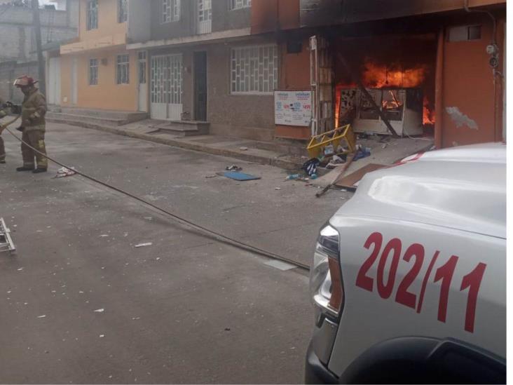 Incendio en vivienda con local de lavandería en Perote; una lesionada