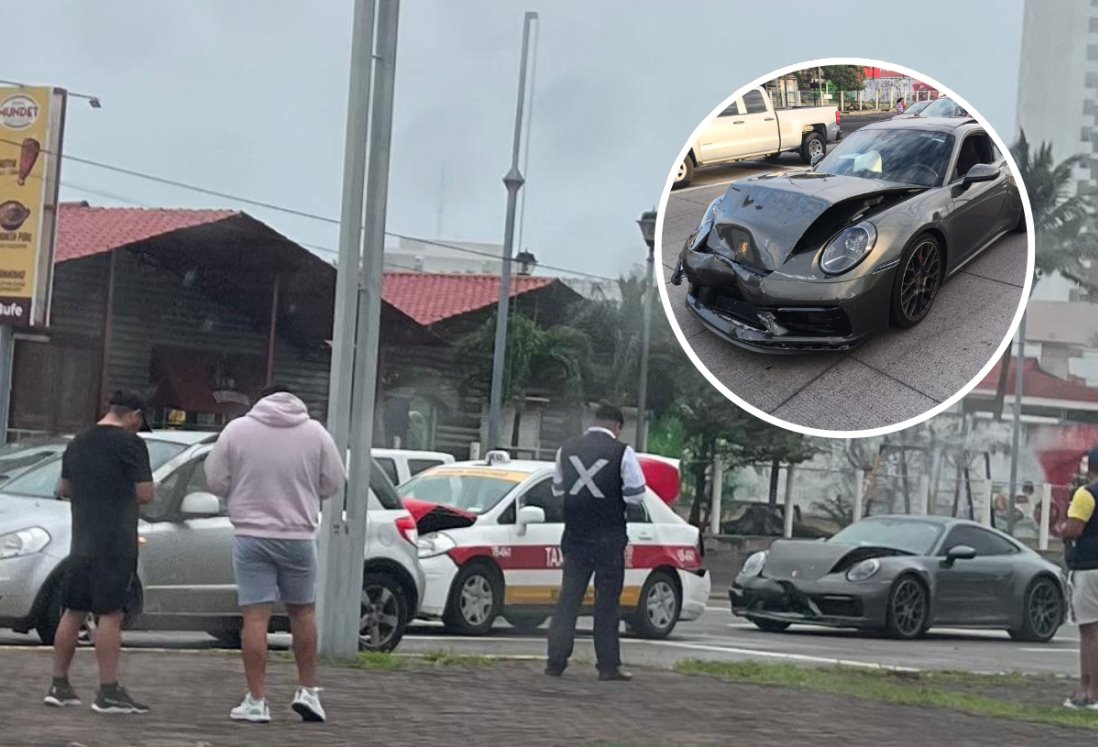 Taxi y auto Porsche chocan en bulevar de Boca del Río