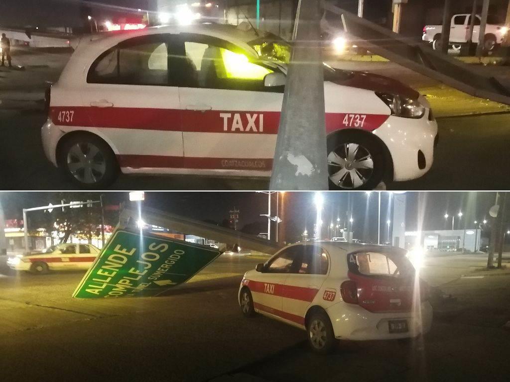 Fuertes vientos derriban señalamiento vial y cae sobre taxi en Coatzacoalcos l VIDEO