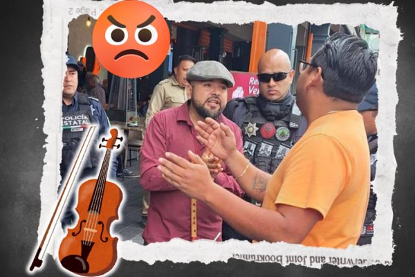En Xalapa, intentan desalojar a músico urbano del Pasaje Enríquez; policía interviene