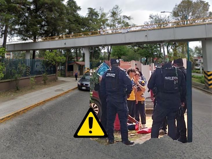 Evitan que mujer se lance de puente peatonal en Xalapa