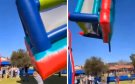 Accidente en festival escolar: castillo inflable vuela con dos niños dentro | VIDEO